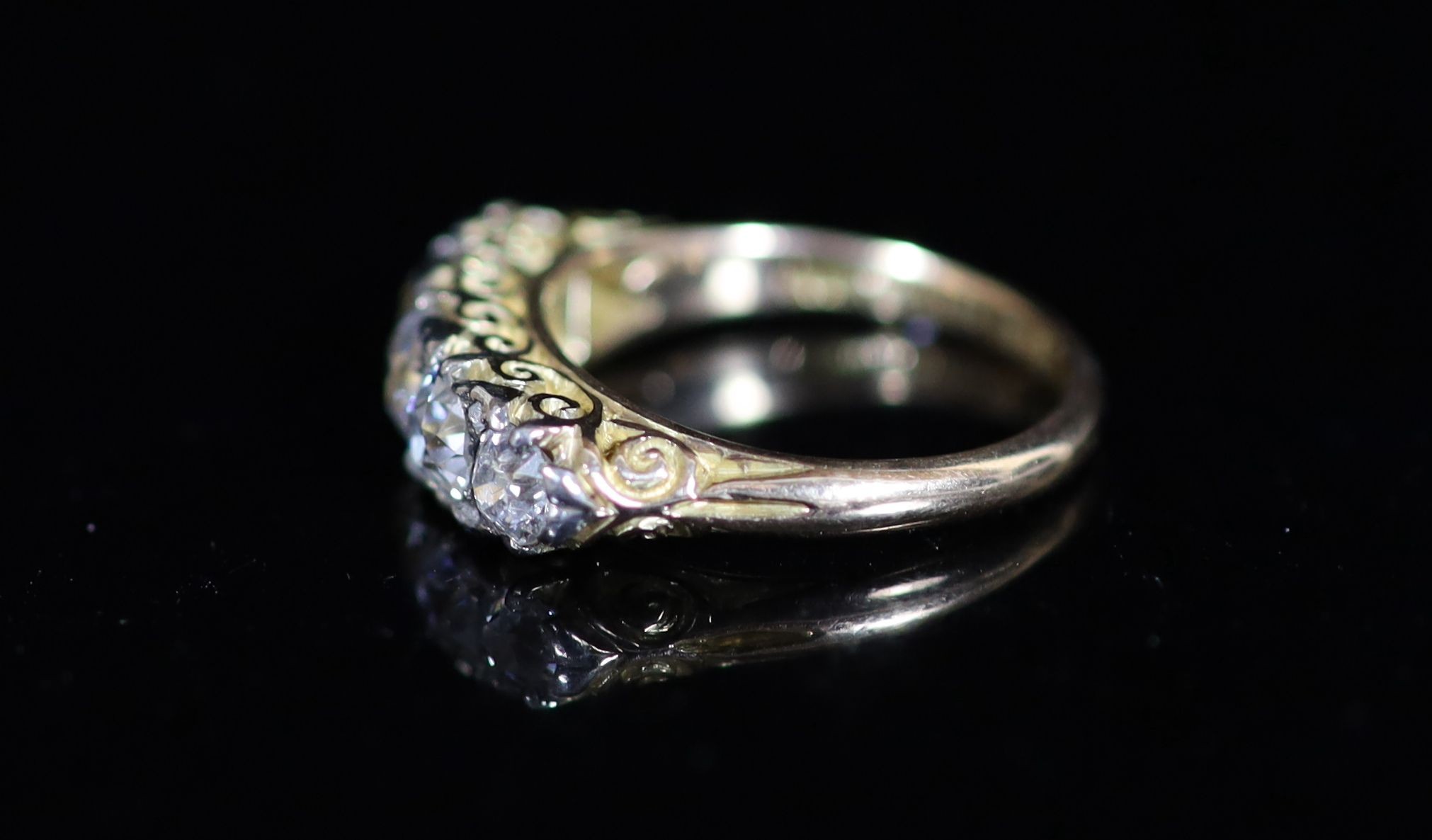 An early 20th century 18ct gold and graduated five stone diamond ring